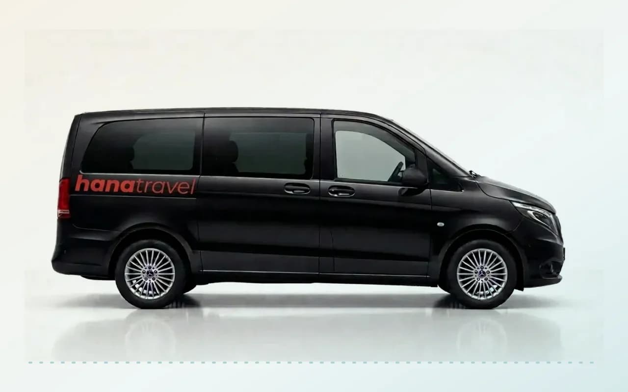 Black Mercedes-Benz Vito VIP airport transfer A side view of a black Mercedes-Benz Vito VIP against a plain white background.